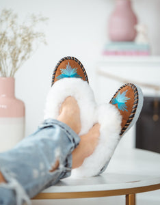 Sheepskin slippers with turquoise embroidery